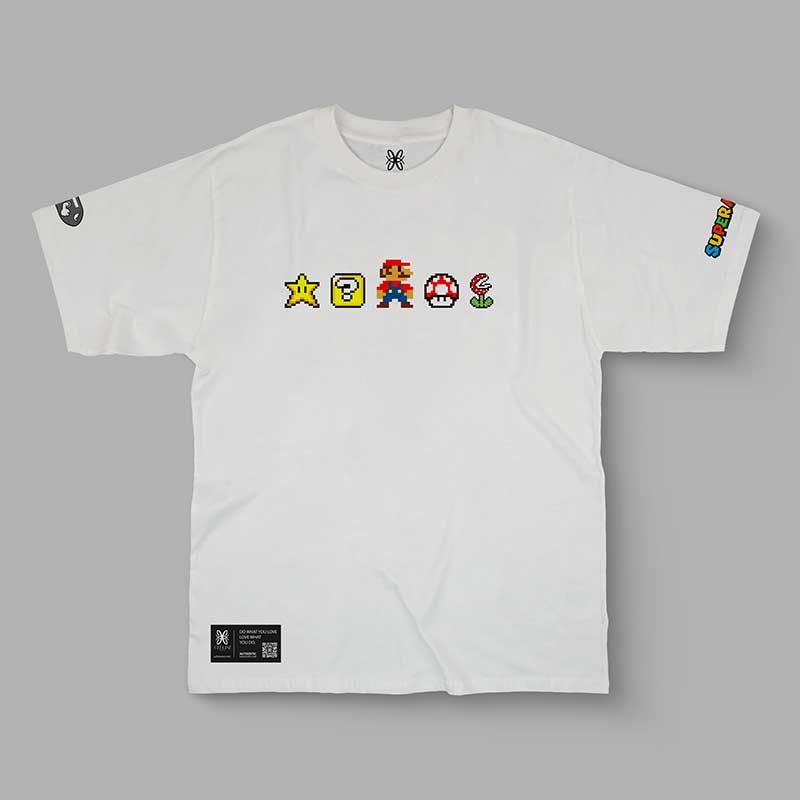 T-shirt oversize Super Mario avec art pixel rétro, logos et illustrations emblématiques 8-bits.